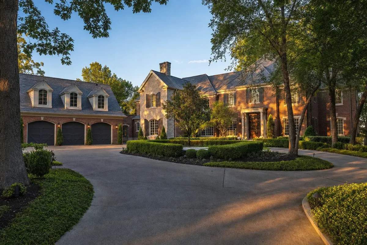 Upscale brick and stone estate home on a wooded lot in Prospect, Kentucky